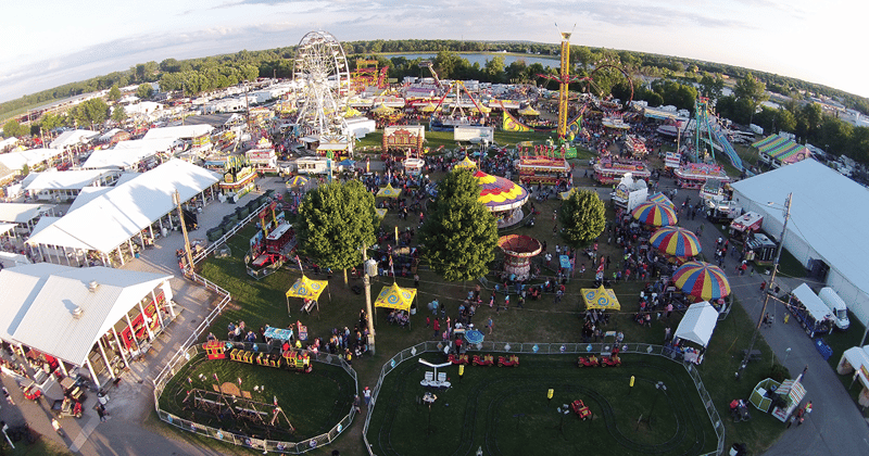 Farm Animals, Ferris Wheels & Funnel Cakes: IN County Fairs You Can't Miss 🐮🎡 cover, Get Indiana