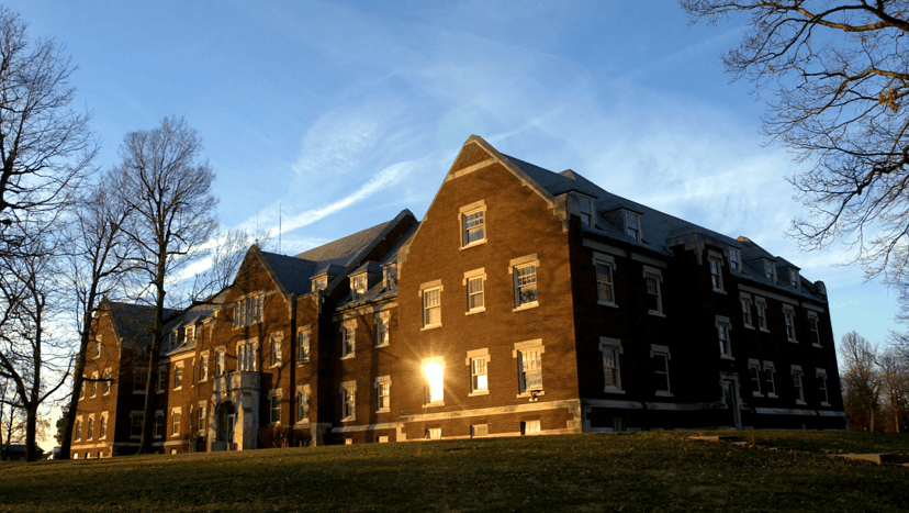 Brick buildings of the former Central State Hospital in Indianapolis at sunset