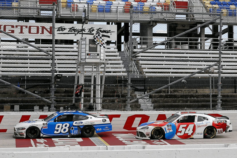 NASCAR Cup Series cars racing at the Brickyard at Indianapolis Motor Speedway