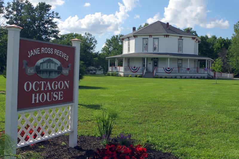 Jane Ross Reeves Octagon House and its sign on a summer day