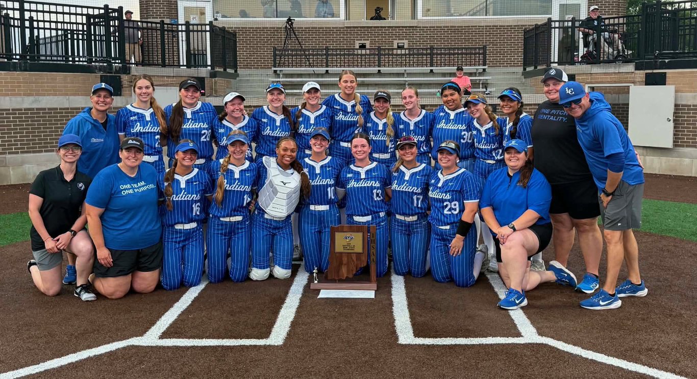 The Lake Central Indians softball team poses with its semi-state championship trophy.
