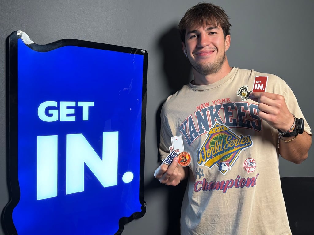 Complete the survey for a chance to win all five of the Get Indiana stickers held by video editor/producer Robbie “Tendy Tuesday” Porter.