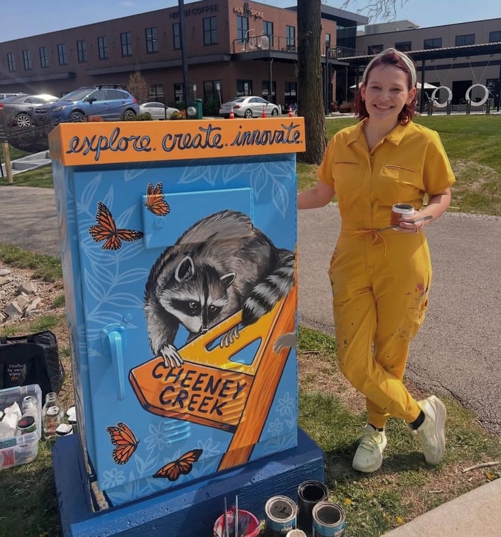 Abigail Staffelbach painted this one outside our Fishers Parks office at Hub & Spoke on the 106 Plaza