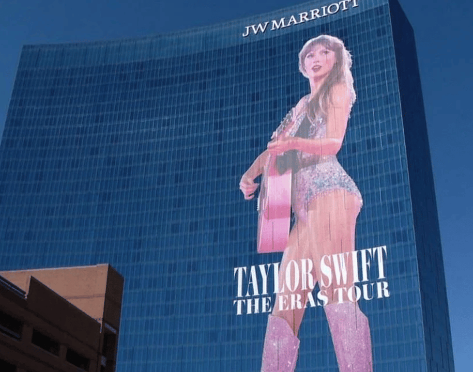 Taylor Swift towering over Indianapolis on the JW Marriott