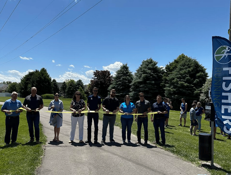 The Fishers Running Club helped cut the ribbon first
