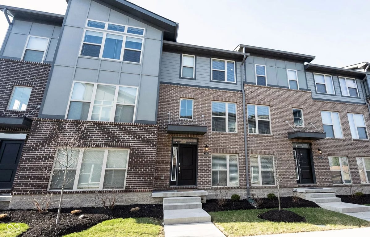 Check out this 2020 townhome that sits right in the middle of some Nickel Plate action.