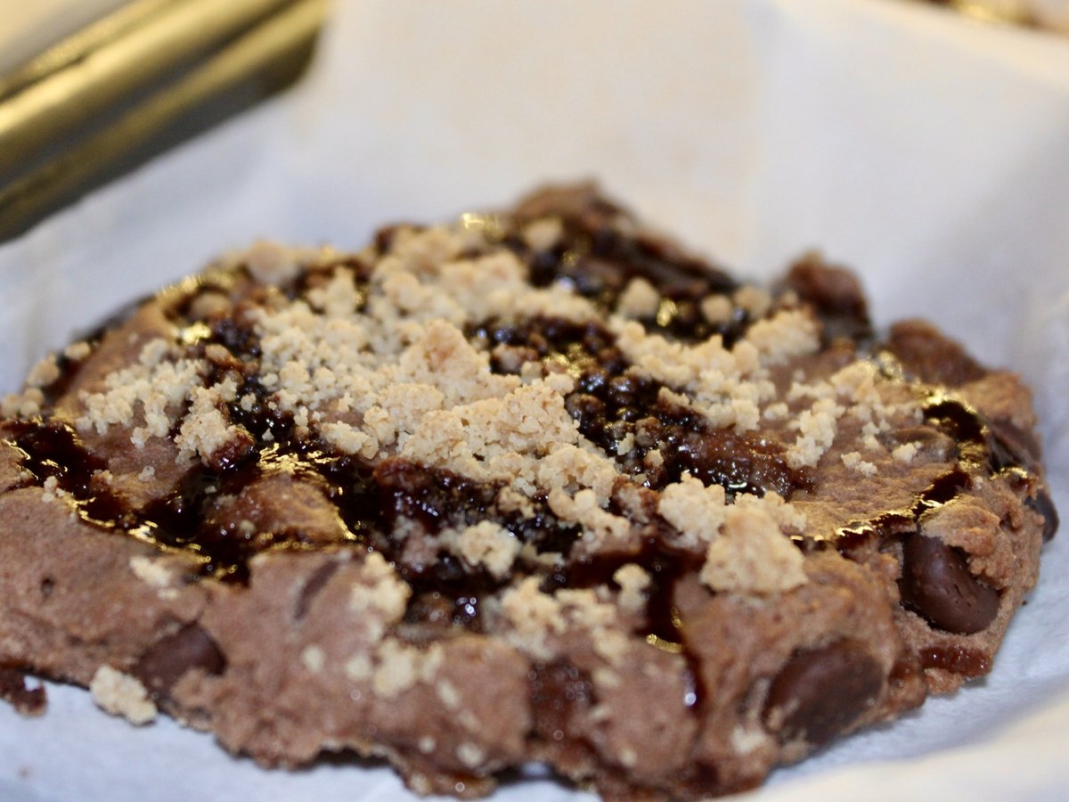 The s'more cookie at Illinois Street Food Emporium, a chocolate cookie baked with marshmallows and topped with graham crumble.