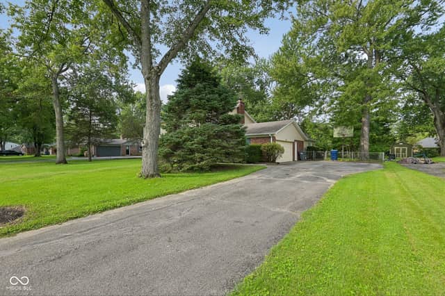 7338 N Layman Avenue, Indianapolis, IN 46250, photo 4 of 64