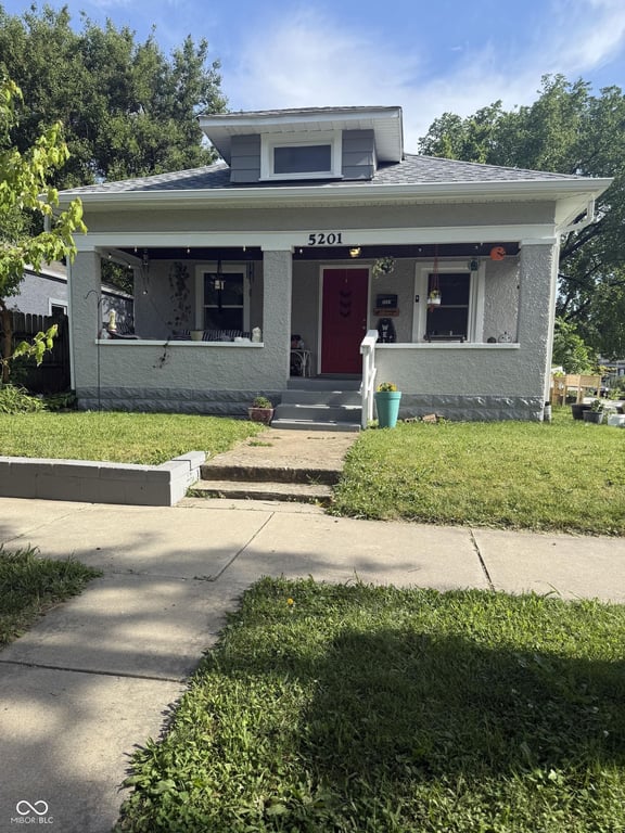 5201 Burgess Avenue, two bedroom bungalow with front porch, exterior photo