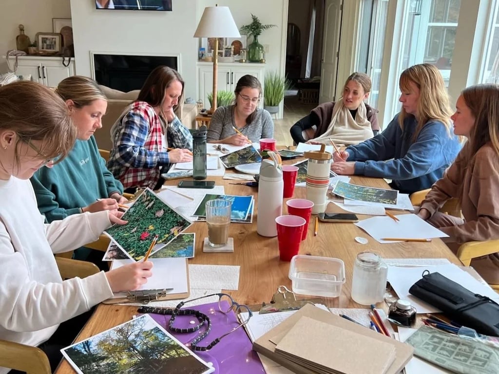 Women of The District Church around a dining table working through a study together