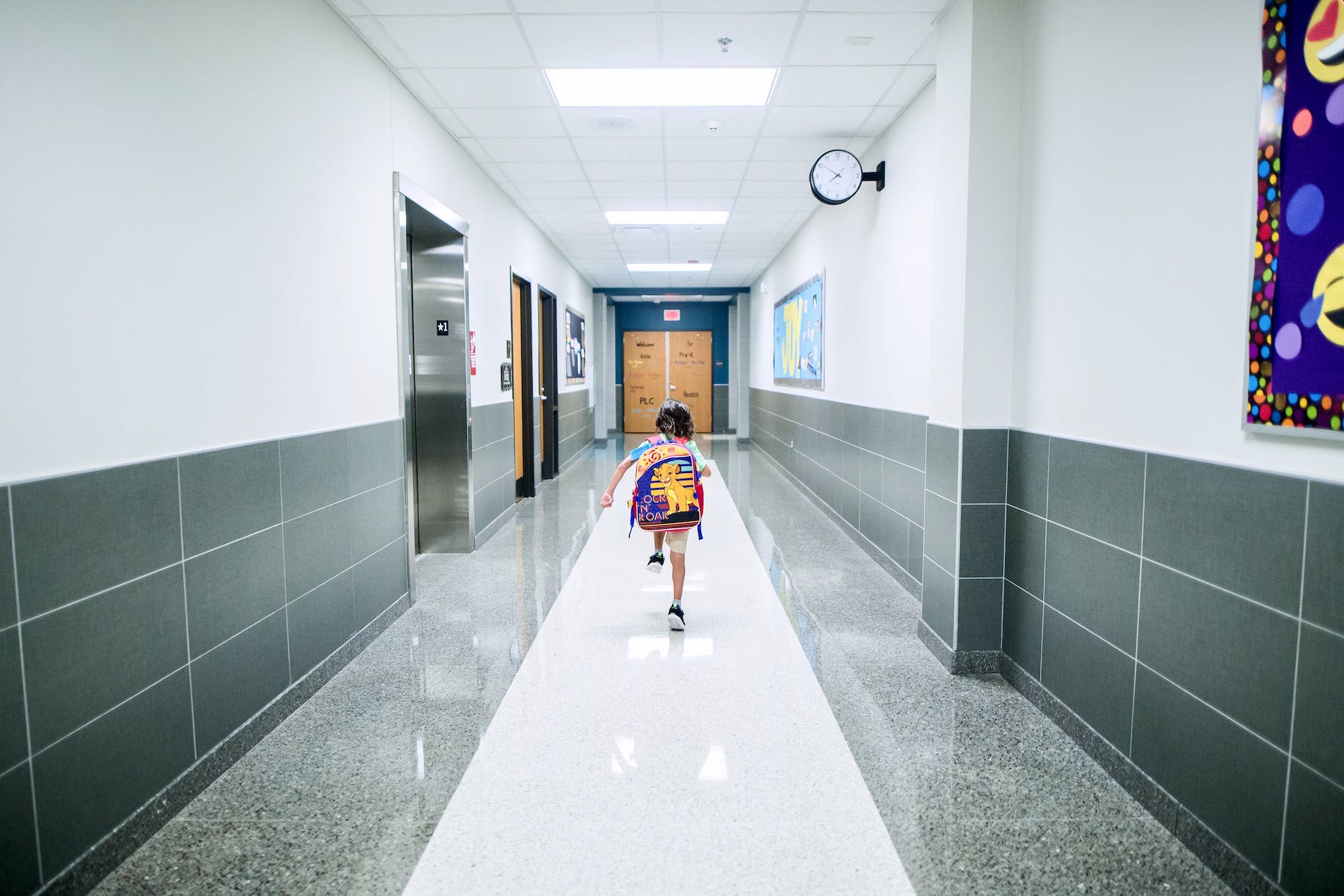 boy running in the hallway