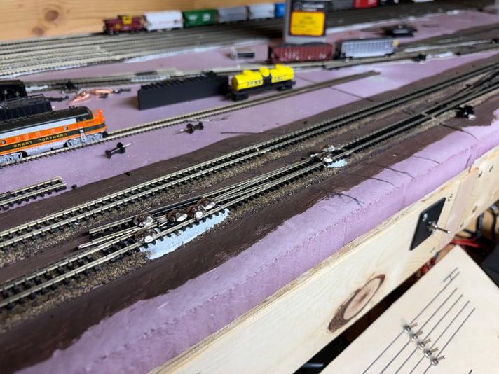 Installed 1 of 2 switches for the new crossover. Day 37 of track work