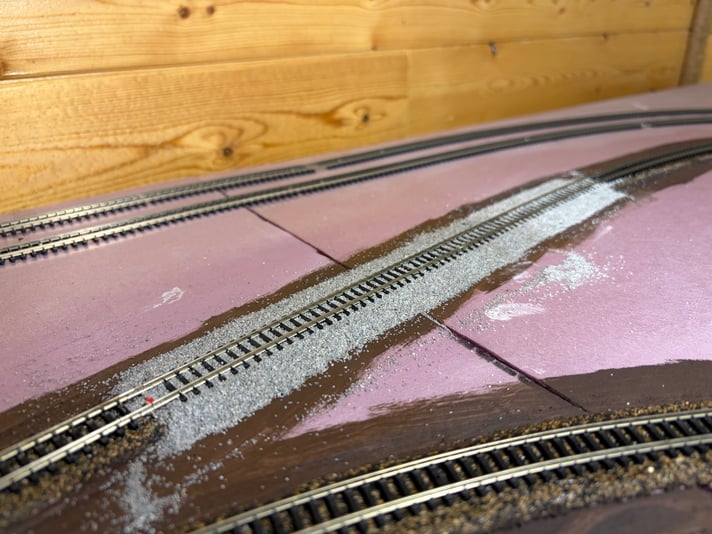 The 2nd section of ballast gluing in. Day 2 of scenery