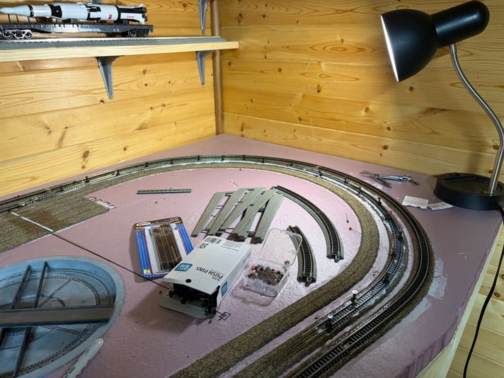 Mainline 1 track around roundhouse curve gluing down, Day 18 of track work