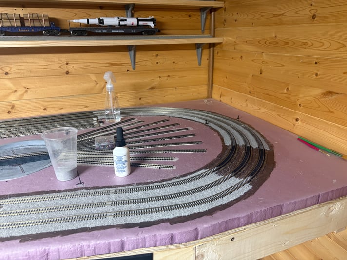 Almost done with ballasting roundhouse curve. Day 7 of scenery