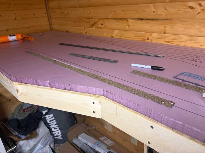 First bit of cork roadbed gluing down, Day 3 of track work