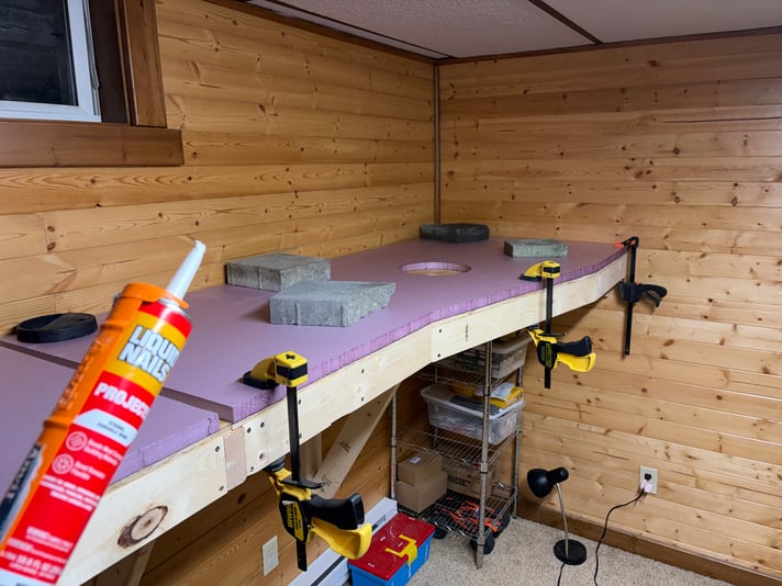 Gluing down the first foam panel, day 6 of benchwork construction