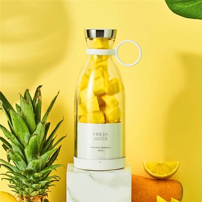 Three portable blenders on a white background