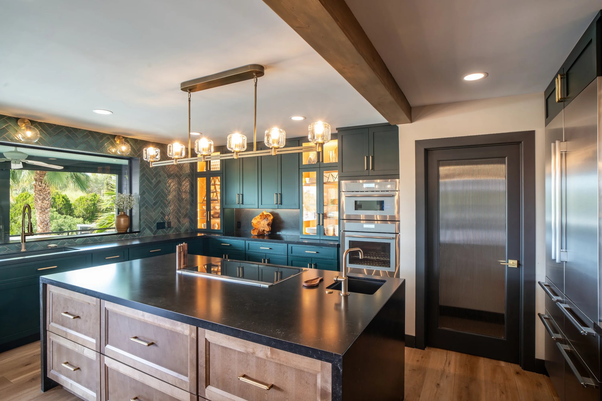 Island with linear chandelier