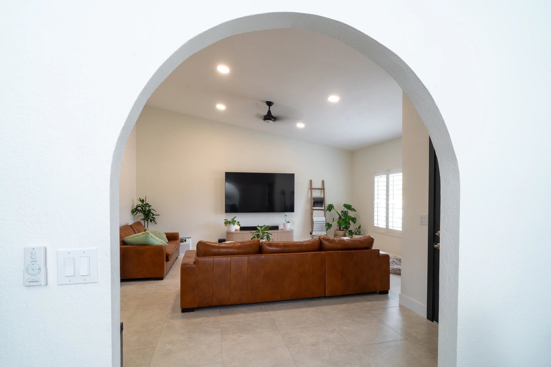 Living room with seating and modern fireplace