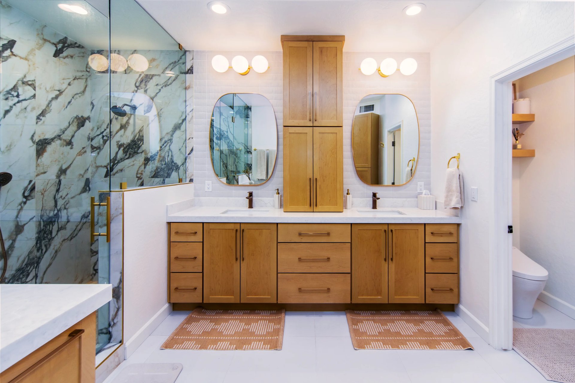 Master bathroom renovation with double vanity and updated fixtures