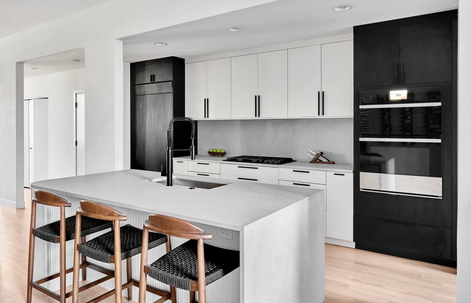 Modern white kitchen remodel with clean lines and ample storage
