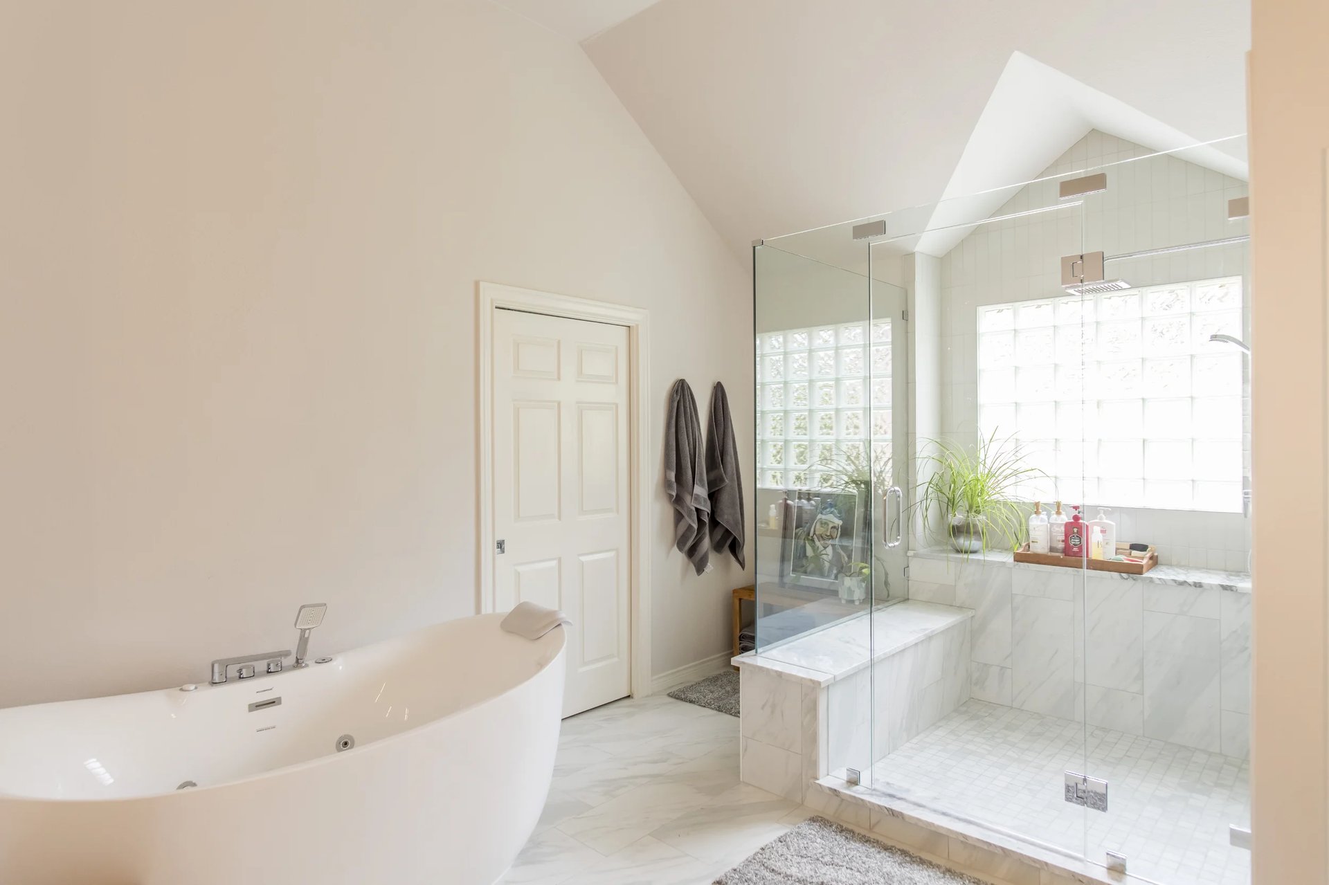 Luxury primary bathroom with double vanity and walk-in shower in Richardson