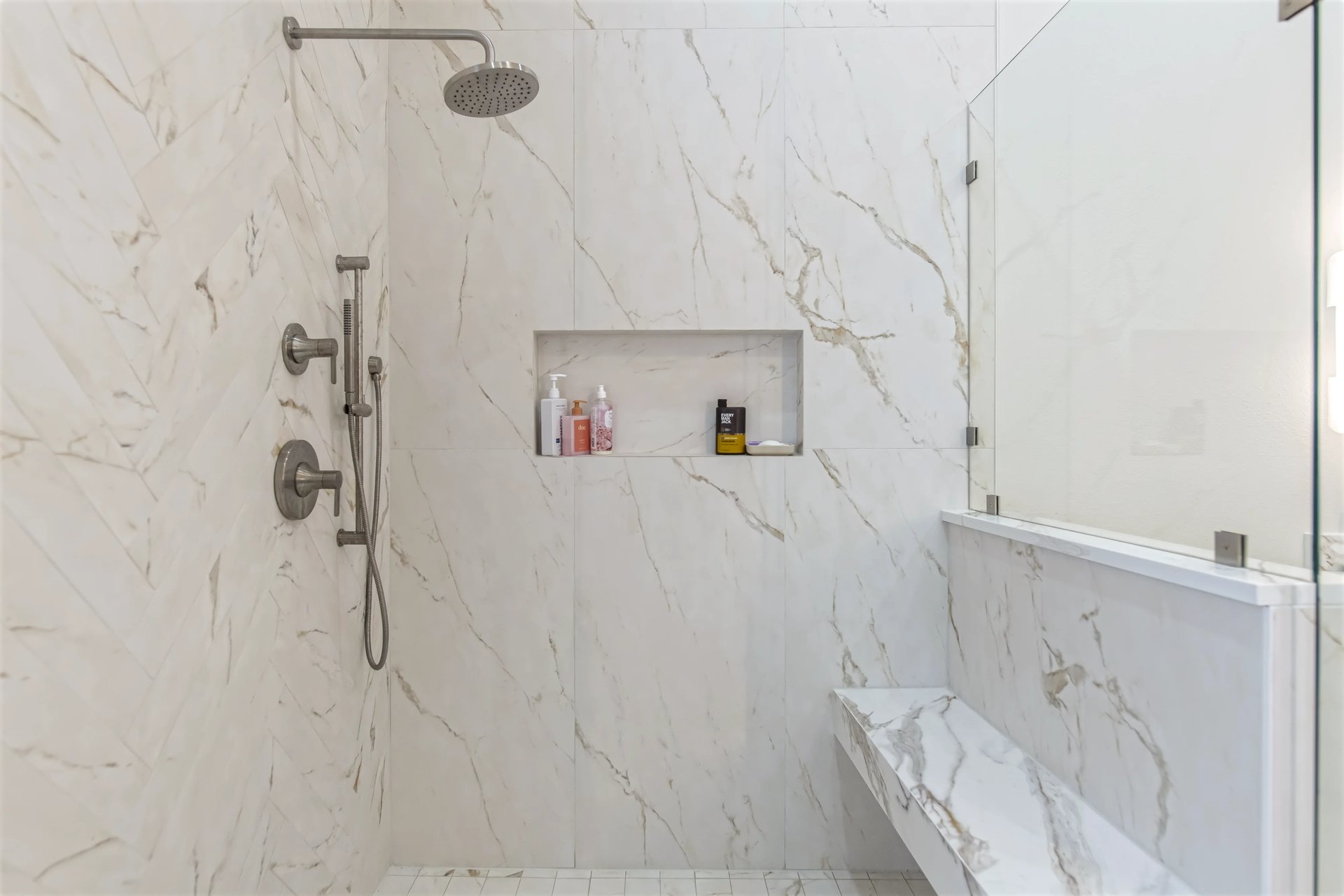 Primary bathroom shower with bench