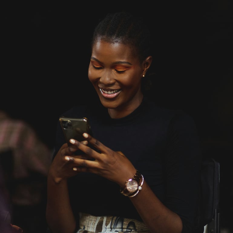 A woman viewing a mobile phone