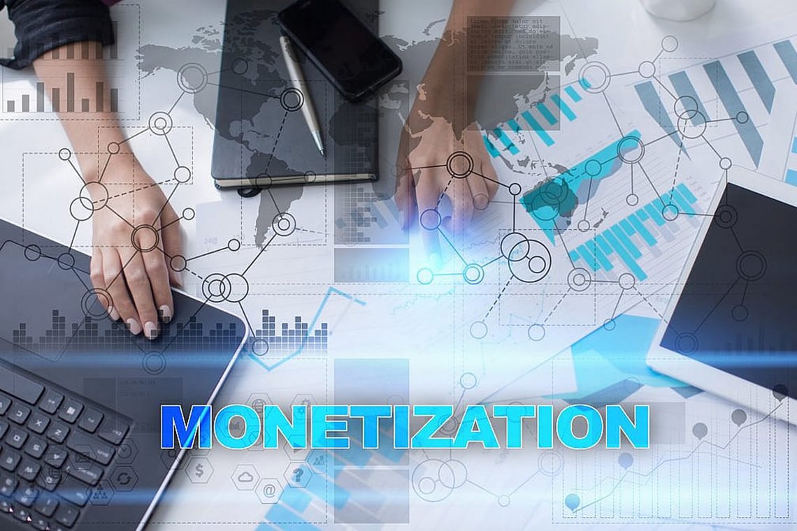 data monetization, woman looking at reports