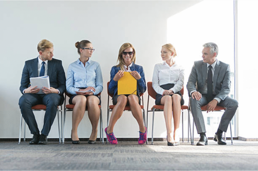 People sitting waiting for an interview