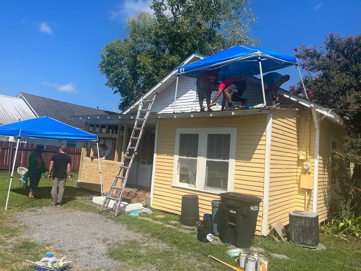 Youth and volunteers serving together