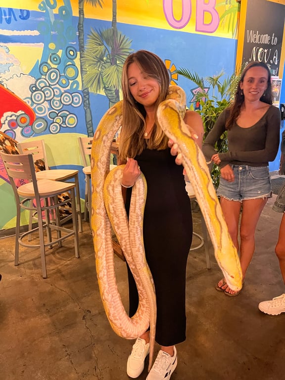 Would you guys hold this snake? (p.s. my mom was mortified I did this)