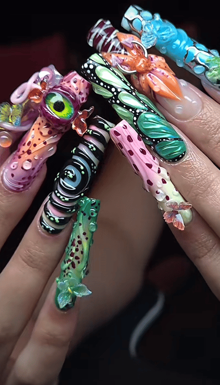 Is nail art a real art form? (Credit: spicycownails on TikTok. Follow her, she’s amazing!)