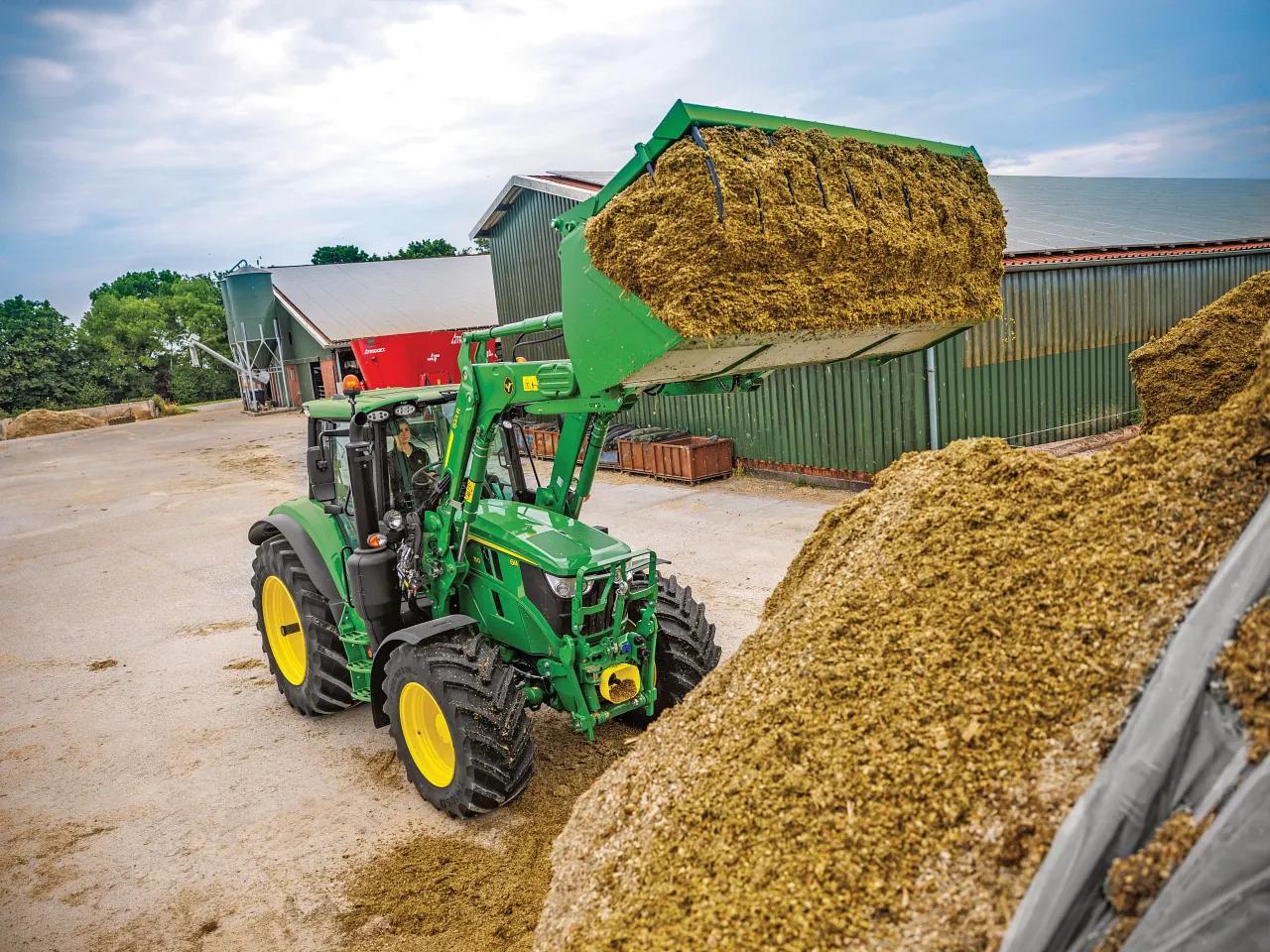 Фронтальний навантажувач John Deere 623R