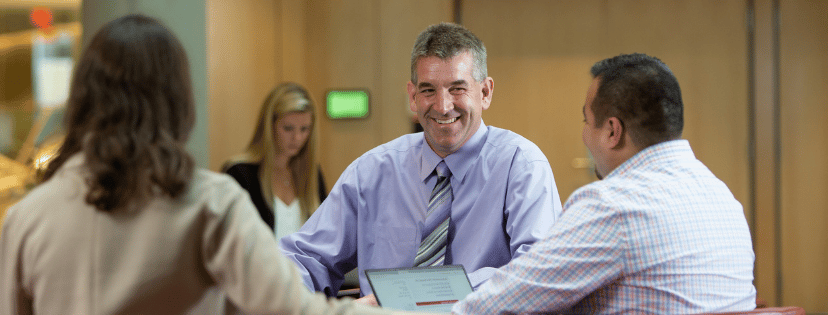 business people collaborating and laughing