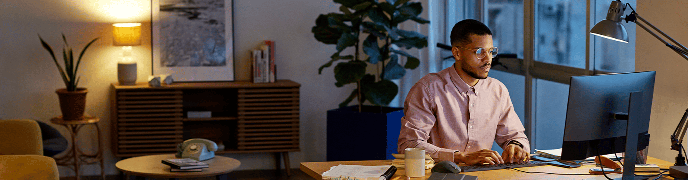 Man sitting at a laptop