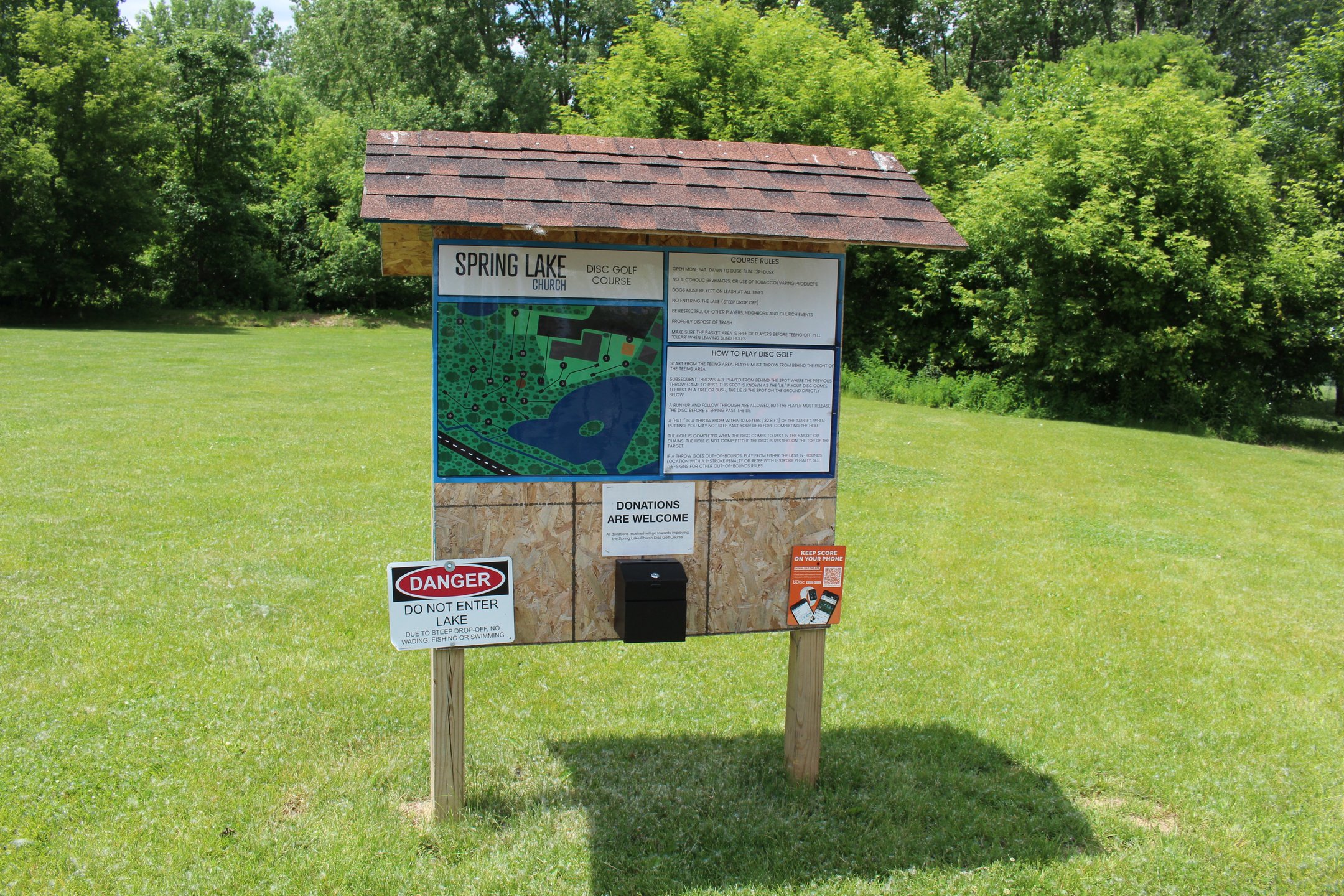 Course sign and donation box!