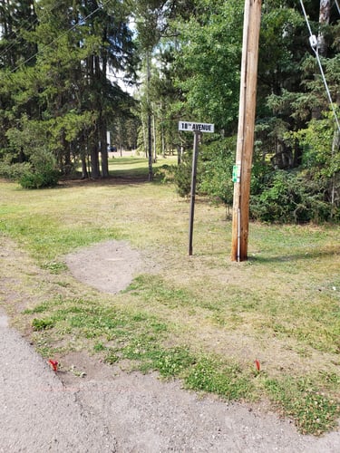 Birdy hole, but you have to get past Scar-face first (beat up poplar in mid gap). Advanced t-box on street. Beginner t-box near sign.