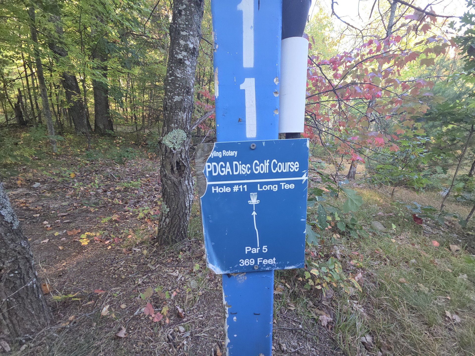 # 11 long tee A/Short tee at top of hill in front of you.