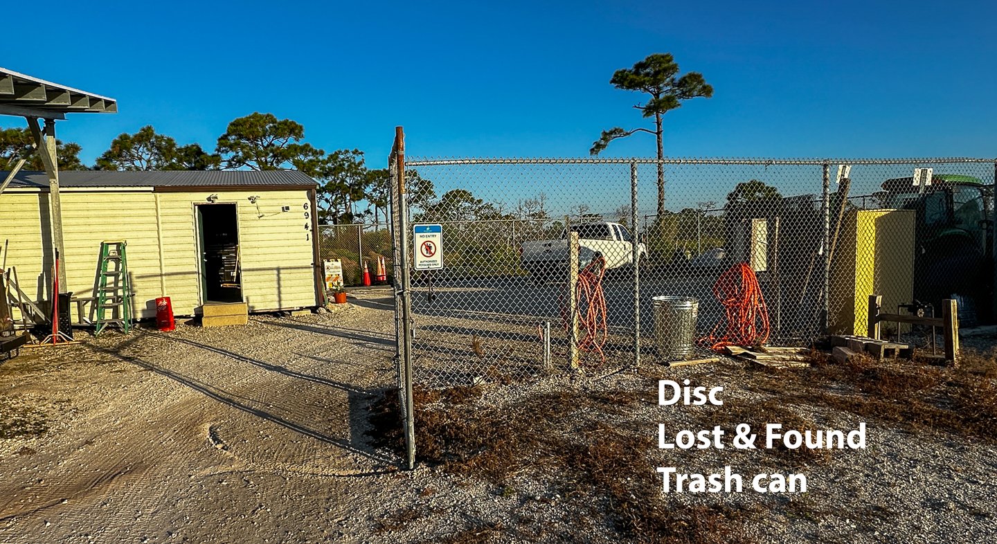 Disc lost and found trash can. Located in maintenance area next to hole 3