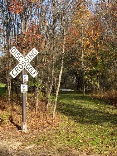 Navigational sign at turnoff to holes 5 & 11.
