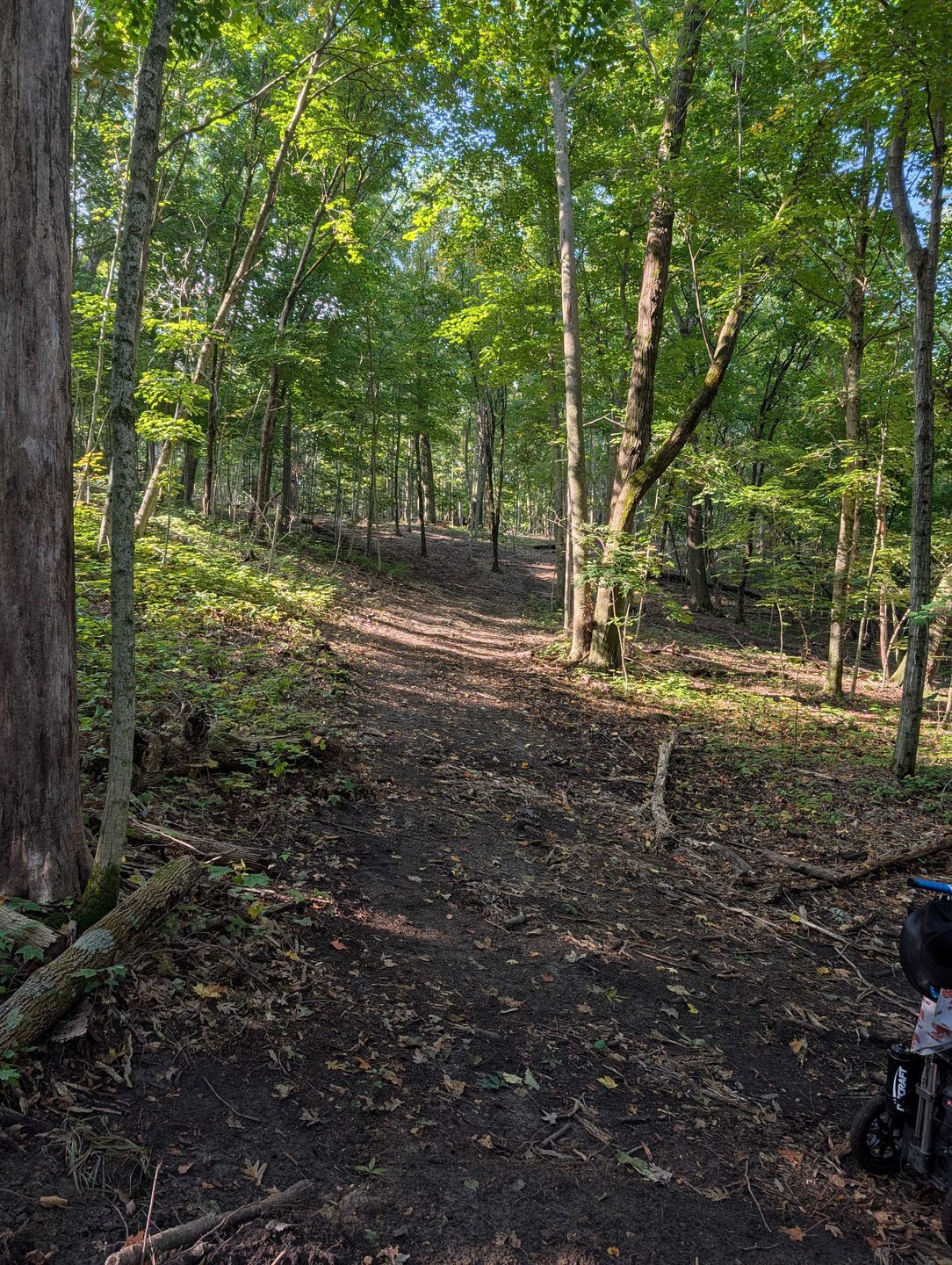 Hole 9 - Fairway from short tee - straight shot uphill that bends slightly to the left