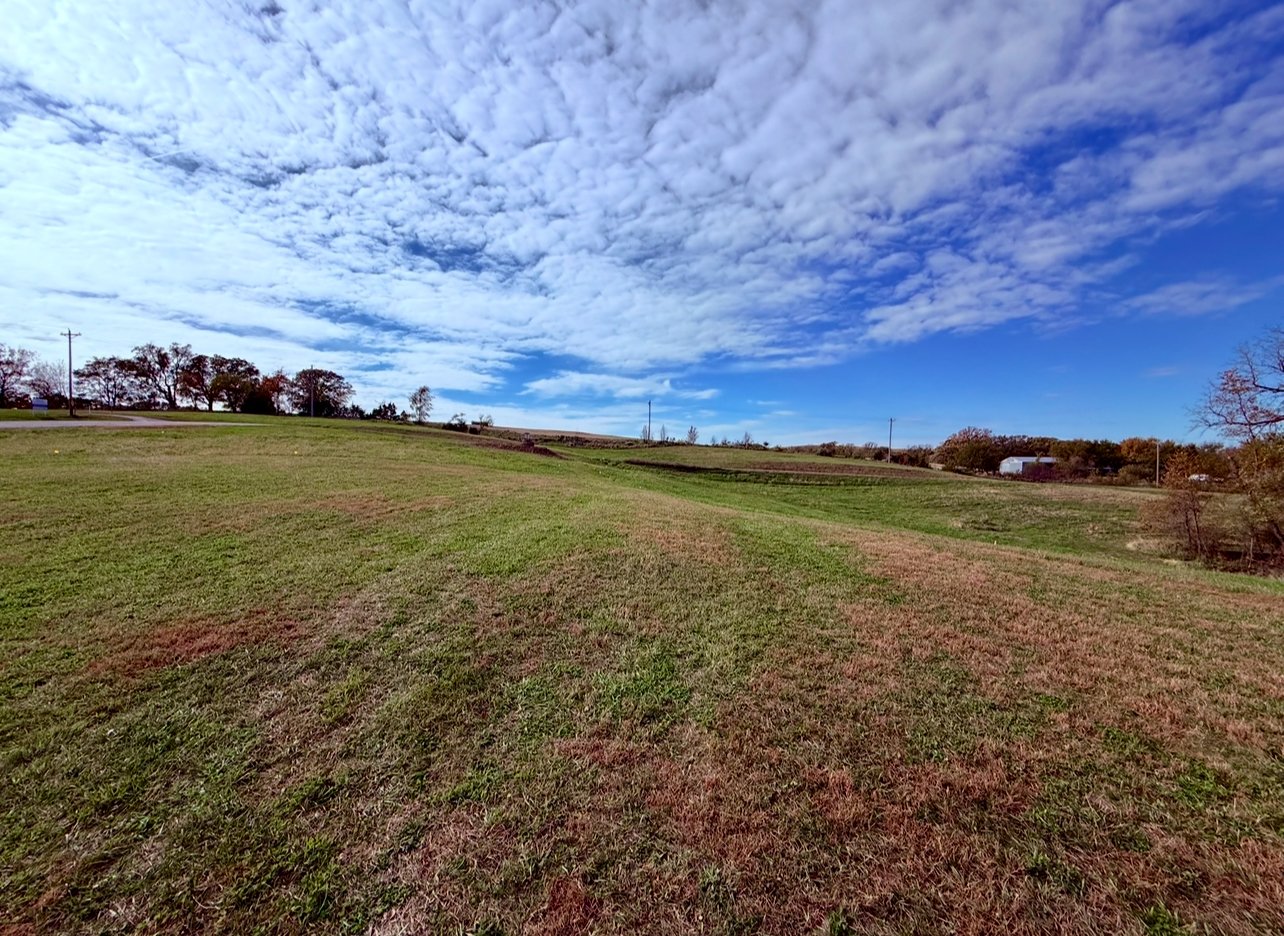 Hole 9 - fairway cont. Green encircled with hazard. 