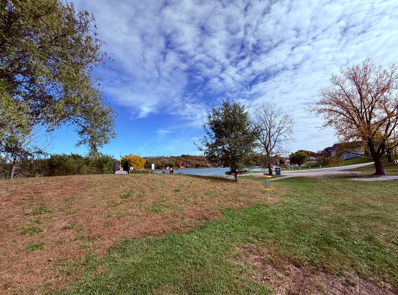 Hole 7 - Short pin. Long on top of dam. 