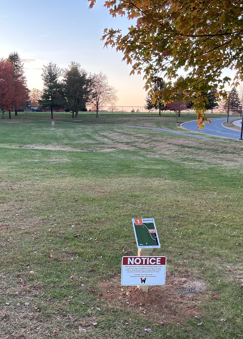Hole #1 starting tee position across from the main Warwick high school parking lot.