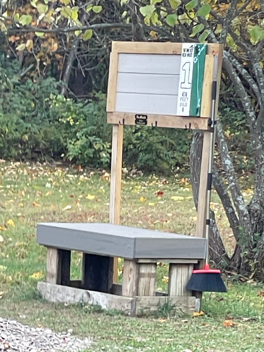 Benches and Brooms on Every Tee Pad