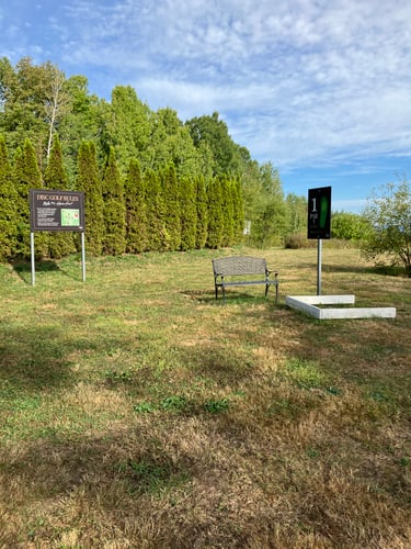 Hole 1 tee and course information sign
