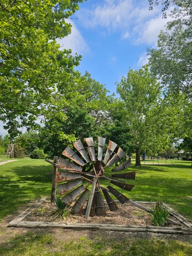 Windmill head landscaping near hole 1 tee pad
