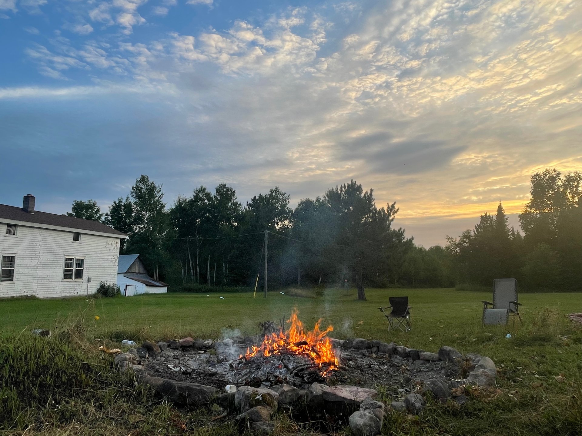 Sunset view overlooking approach into hole 1 and tee box for hole 2 from the bonfire pit. 